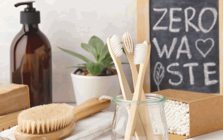 Non-toxic living essentials including natural soap bars, bamboo toothbrushes, refillable glass bottles, and zero-waste bathroom swaps for beginners.