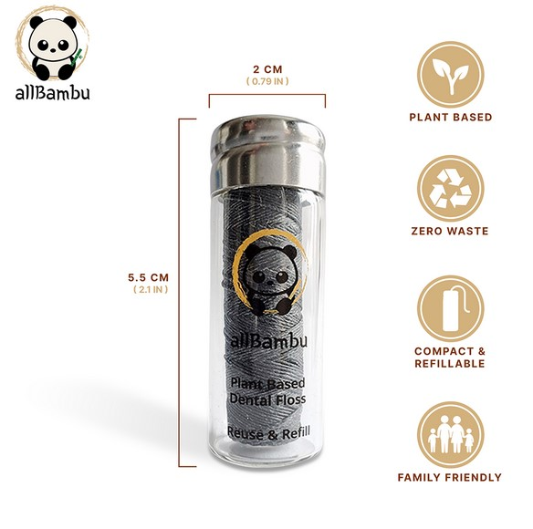 Charcoal spearmint flavoured dental floss in glass tube made from plant-based materials, derived from organic corn starch