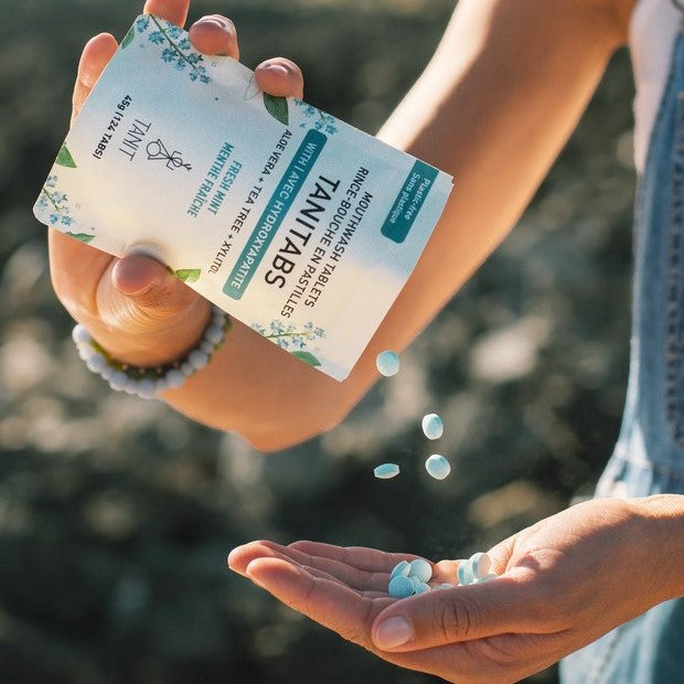 Canadian made Tanitabs mouthwash tablets being poured into a hand