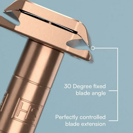 Close-up of the textured copper handle with engraved logo on the Henson AL13 Razor, showcasing its matte finish and fine