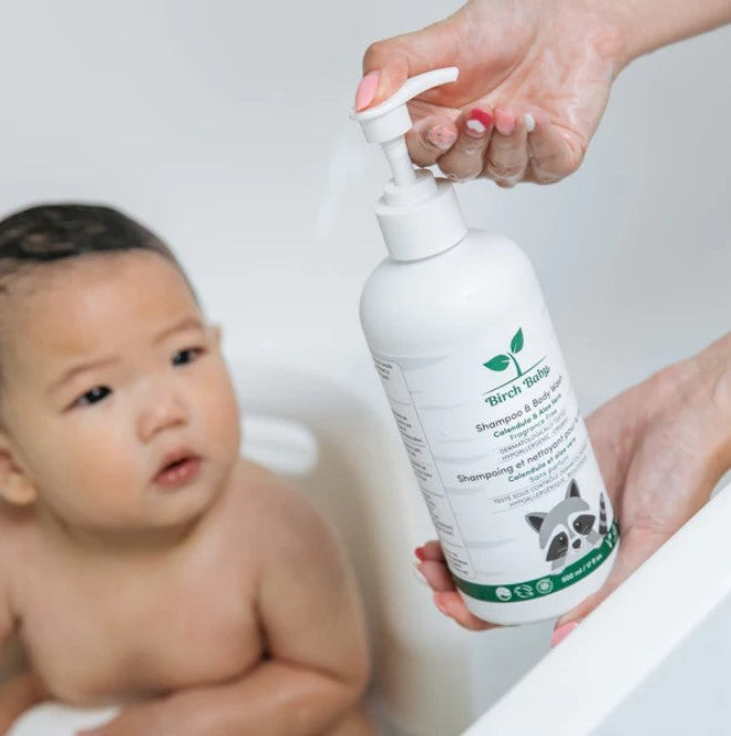 Close-up of Birch Baby Shampoo label highlighting natural ingredients and gentle soothing formula on a white background