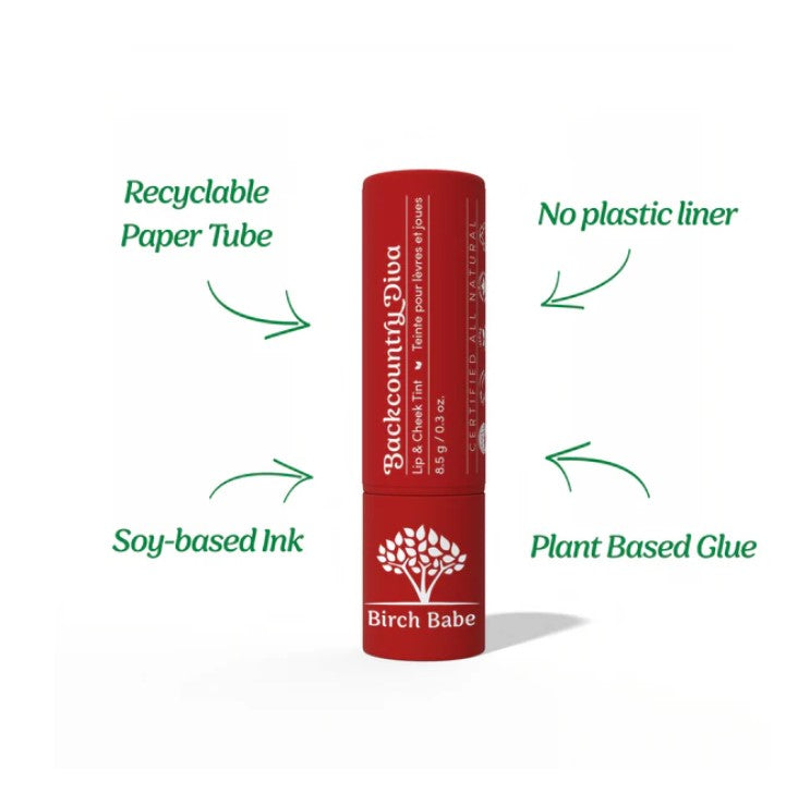Close-up of the Lip & Cheek Tint tube cap revealing Birch Babe logo and warm beige packaging detail.