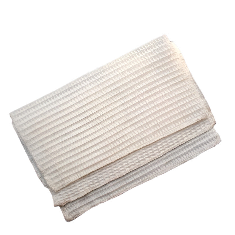 Close-up of woven bamboo fibers highlighting the soft texture and natural finish of the kitchen cloth.