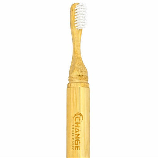 Bamboo travel toothbrush with soft bristles in reusable bamboo case by Change Toothpaste eco friendly oral care