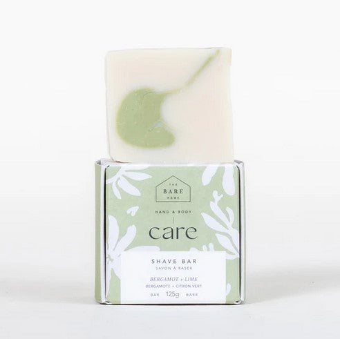 The Bare Home Bergamot Lime shave bar in textured white plastic container with green and orange label, 3 oz