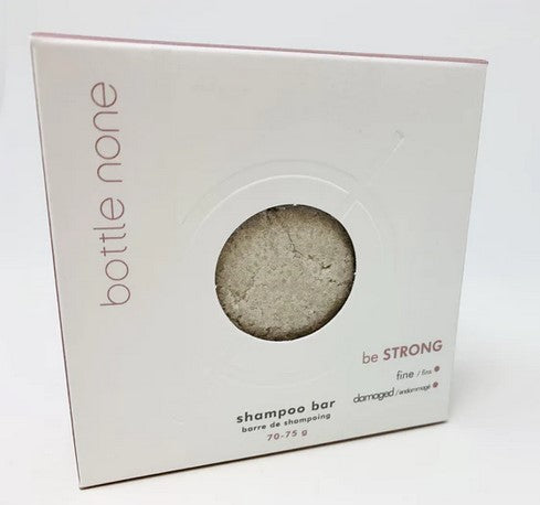 Bottle None be STRONG Shampoo Bar for damaged hair, 50+ washes, natural ingredients, citrus scent, solid texture