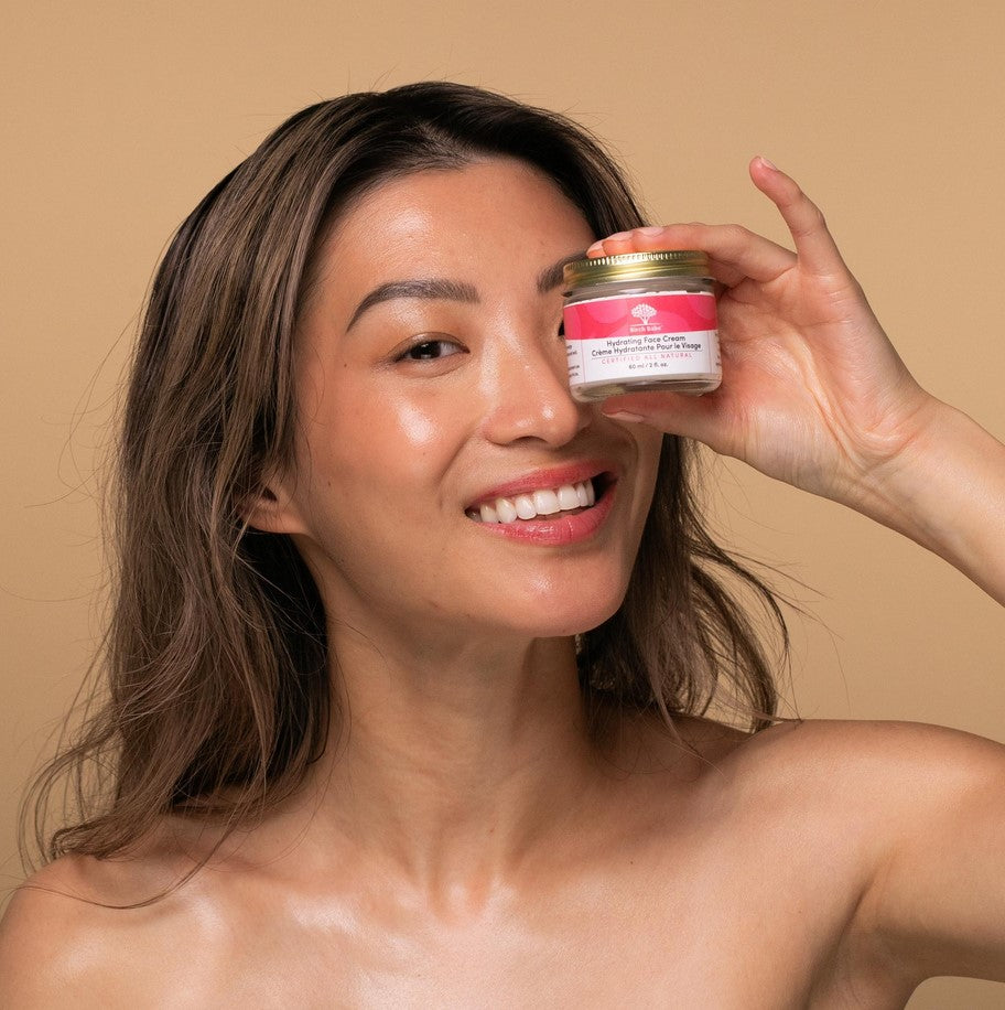 Close-up of Birch Babe Hydrating Face Cream jar highlighting textured cream and fresh botanical scent with soft, natural