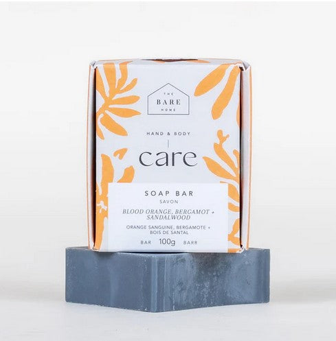The Bare Home blood orange bergamot and sandalwood soap bar with textured orange and brown design, 4 oz capacity, handmade
