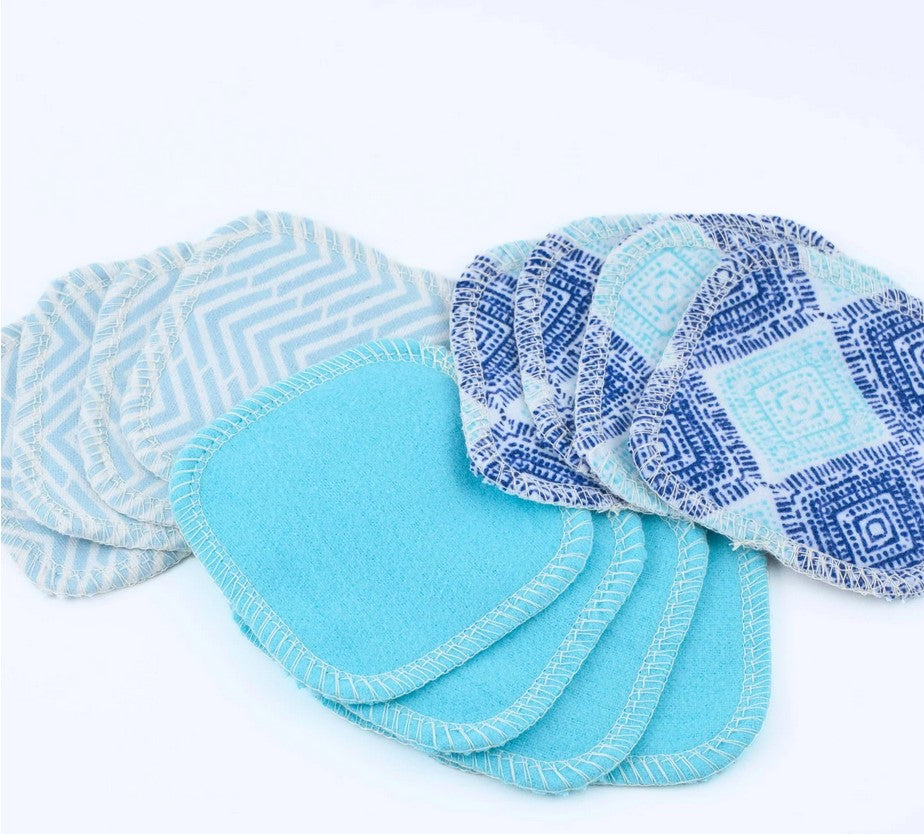 Close-up of the Seaside pattern on reusable facial rounds showing textured microfiber surface and stitched edges.