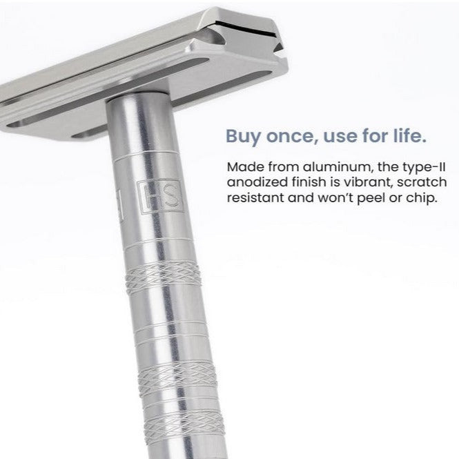 Close-up of the Henson Razor AL13's textured black handle grip with subtle matte finish and precision-machined details.