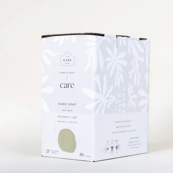 Close-up of clear plastic pump dispenser with Bergamot Lime Hand Soap label and green accents, highlighting packaging