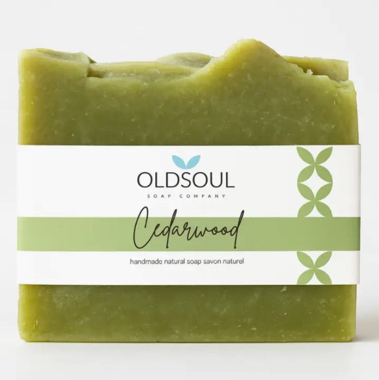 Cedarwood artisan soap bar with textured beige surface, stamped Old Soul Soap Company logo, Vegan, Canadian-made, 3x2 inches