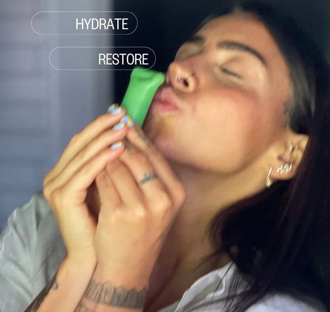 Close-up of daily moisturizer jar showing textured cream and botanical ingredients label on the side