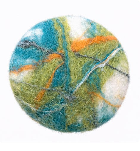 Close-up of felted cedar sage soap’s 'earth tones' textured surface highlighting natural fibers and intricate felting details on a white background.