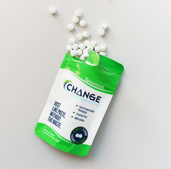 Change Toothpaste Spearmint tablets in white plastic container with green label, designed for oral hygiene, fluoride-free
