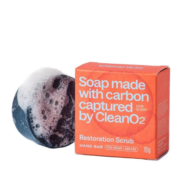 CleanO2 Restoration Scrub Hand Bar with packaging and foaming charcoal soap made in Canada using carbon-captured ingredients