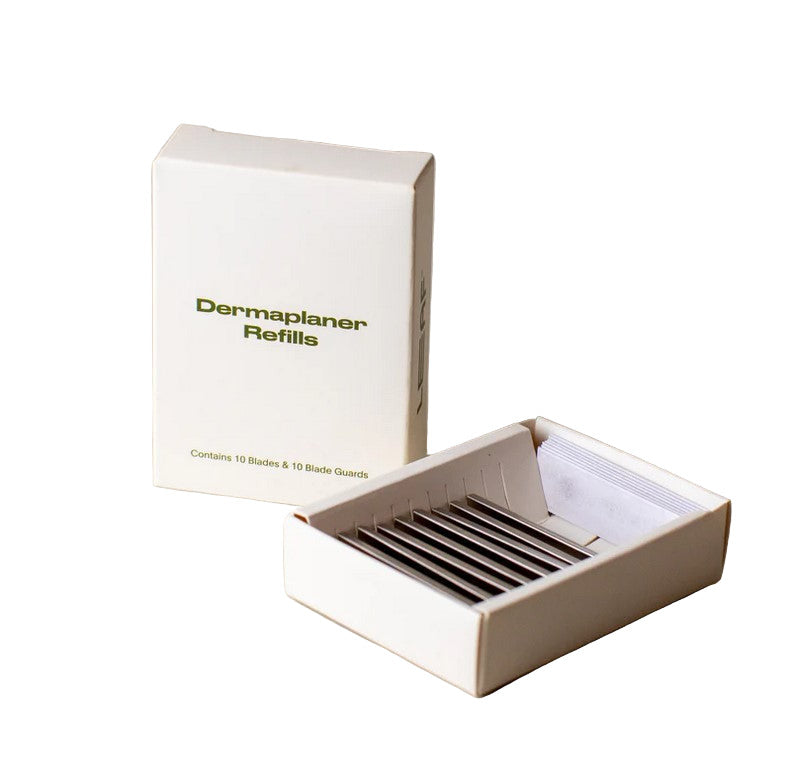 Leaf dermaplaner blade refills with stainless steel leaf-shaped blades for precise facial shaving and exfoliation.