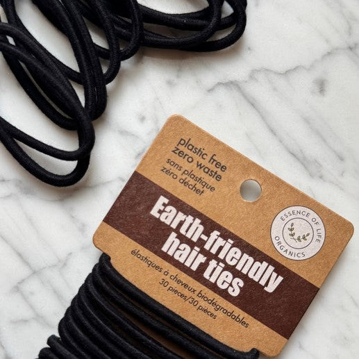Biodegradable black hair ties by Essence of Life Organics, eco-friendly, compostable, and made from sustainable materials