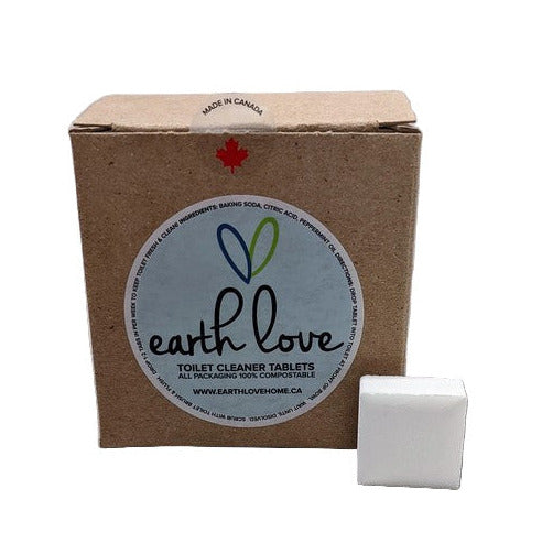 Earth Love toilet cleaner tablet in biodegradable packaging, yellow color, compact size, designed for bathroom use