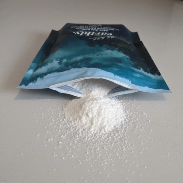 Earthly Change natural dishwasher detergent powder spilling from eco friendly refill pouch