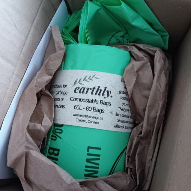 Close-up of Earthly compostable garbage bag's textured surface and eco-friendly fiber details in natural light