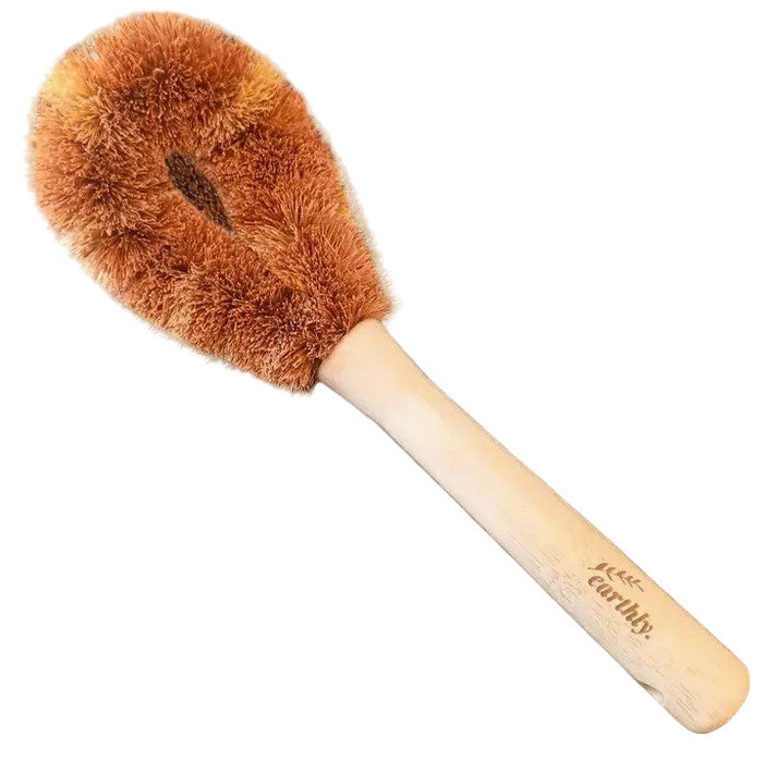 Close-up of natural bamboo bristles on the cleaning brush, showing textured surface and ergonomic handle grip