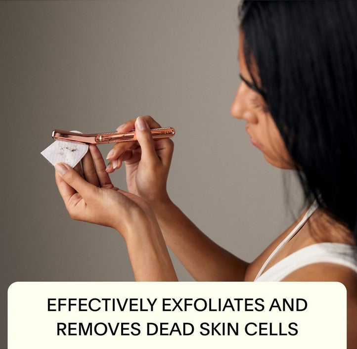 Close-up of the Mercury Leaf Dermaplaner’s stainless steel blade with textured edge, angled to showcase precision shaving