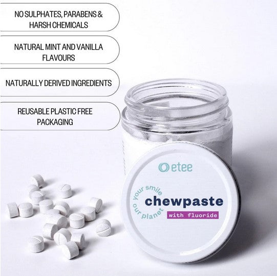 Close-up of Fluoride Chewpaste tablets showing textured surface and rounded edges, highlighting portability and compact