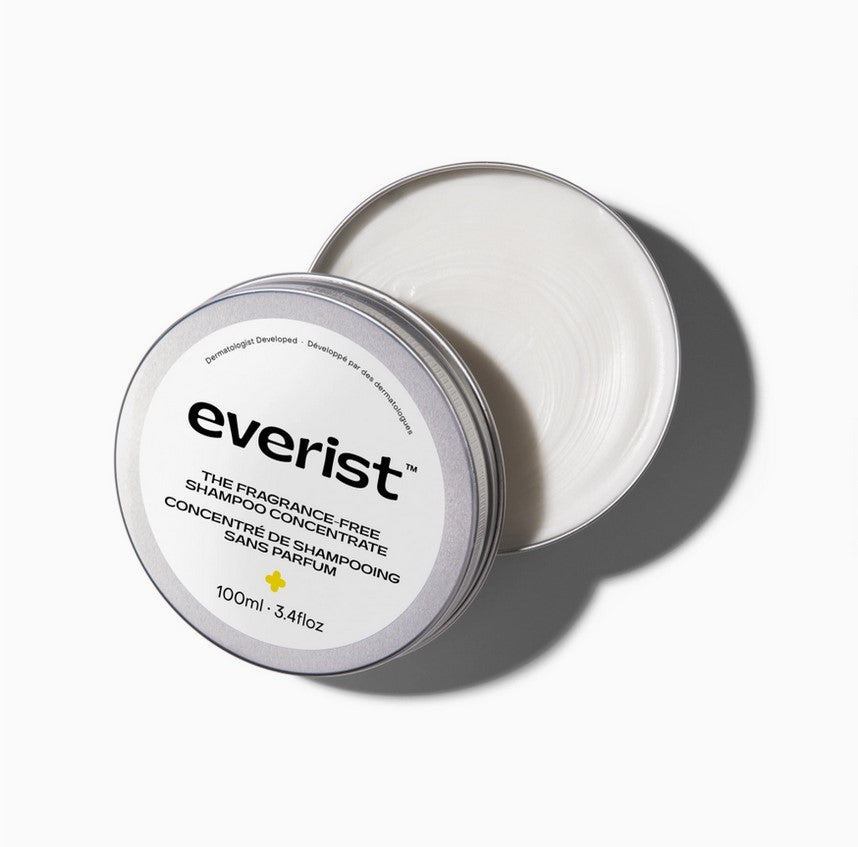 Everist fragrance-free shampoo concentrate tin with smooth metallic finish, compact size, and minimal branding for gentle