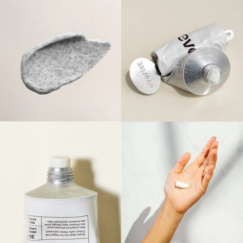 Close-up of the Everist exfoliating body wash concentrate tube displaying the textured label and bright teal cap