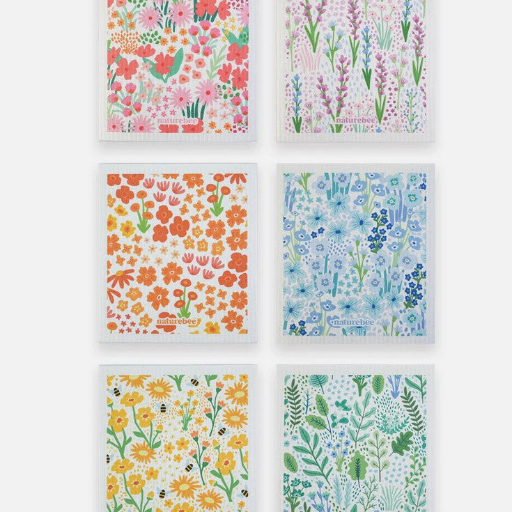 Colorful Nature Bee sponge cloth set featuring floral and bee patterns on reusable Swedish dishcloths for eco-friendly