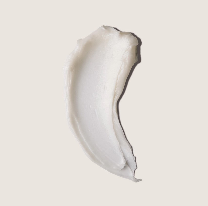 Close-up of the Everist Conditioning Concentrate Tin showing minimalist design and fragrance-free label detail