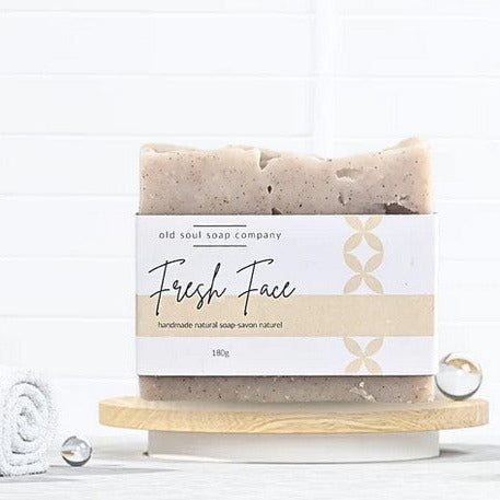 Fresh Face Facial Soap bar with pale yellow color, textured surface, Old Soul Soap Company branding, made in Canada, vegan