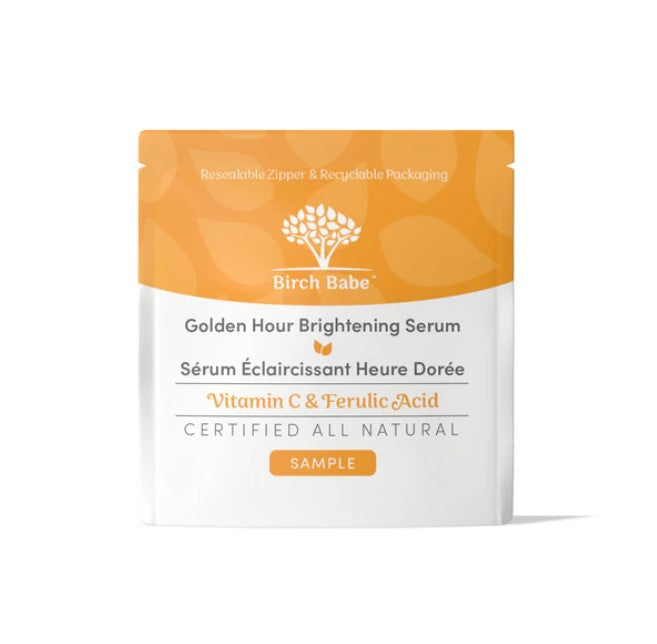 Close-up of the Golden Hour Brightening Serum bottle highlighting the sleek amber glass and subtle aroma of botanical