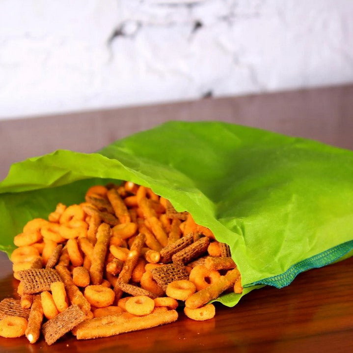 Close-up of beeswax coating on the fold of a reusable sandwich bag, highlighting natural texture and hand-crafted