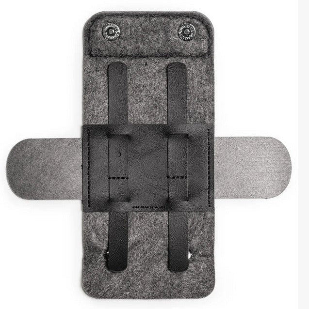 Open Henson Razor Travel Case showing merino wool interior, vegan leather straps and magnetic snap closures