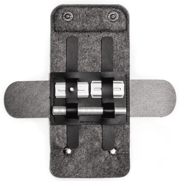 Henson Razor Travel Case opened with safety razor handle and razor head stored under secure vegan leather loops