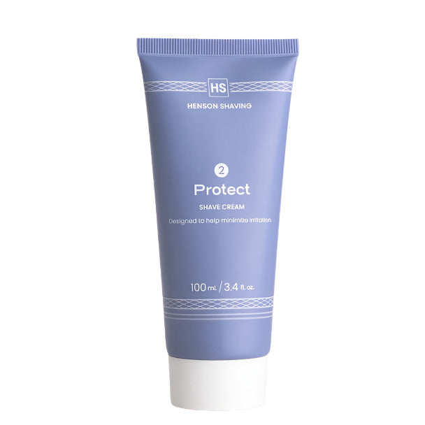 Close-up of Henson Shave Cream tube displaying detailed ingredients and textured surface from a top-down angle.