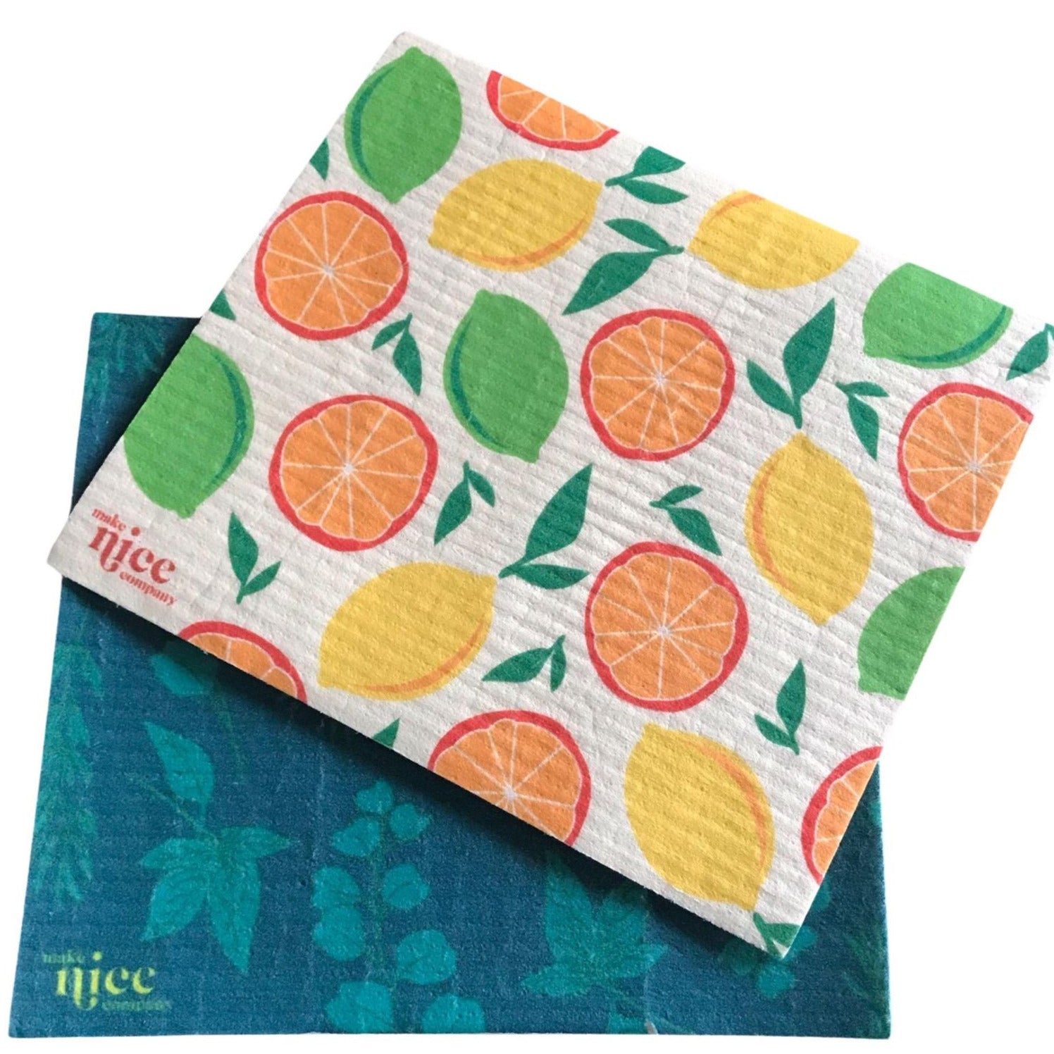 Close-up of vibrant yellow and green Swedish sponge cloths demonstrating soft, textured cellulose surface with colorful