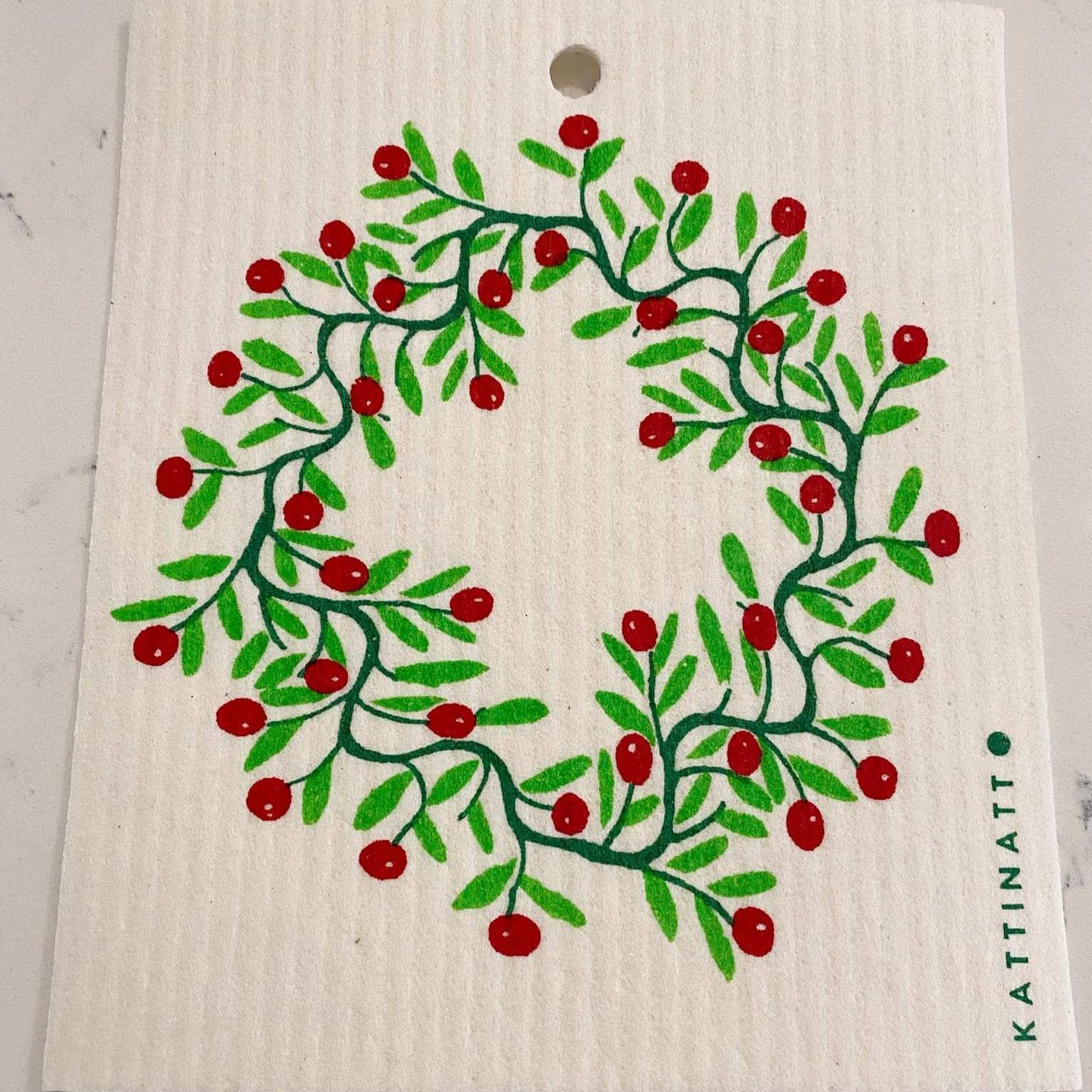 Kattinatt Holly Wreath Swedish dishcloth with red and green holly design, textured cellulose fabric, 8x8 inches