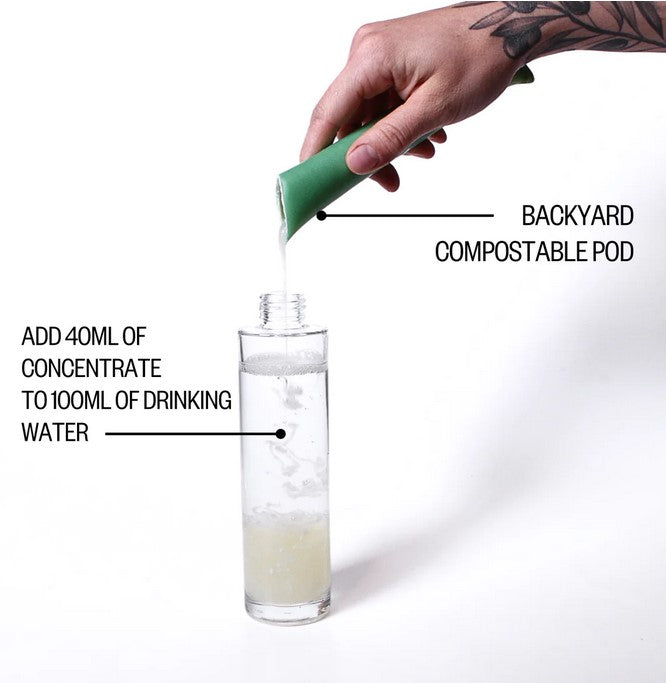 Close-up of facial cleanser concentrate dropper revealing lightweight, silky texture and subtle floral scent on clear vial.