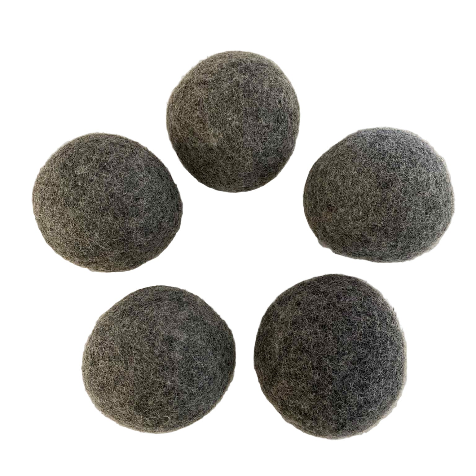 Close-up of Earthly Wool Dryer Balls' textured surface highlighting soft, fibrous natural wool fibers from an overhead