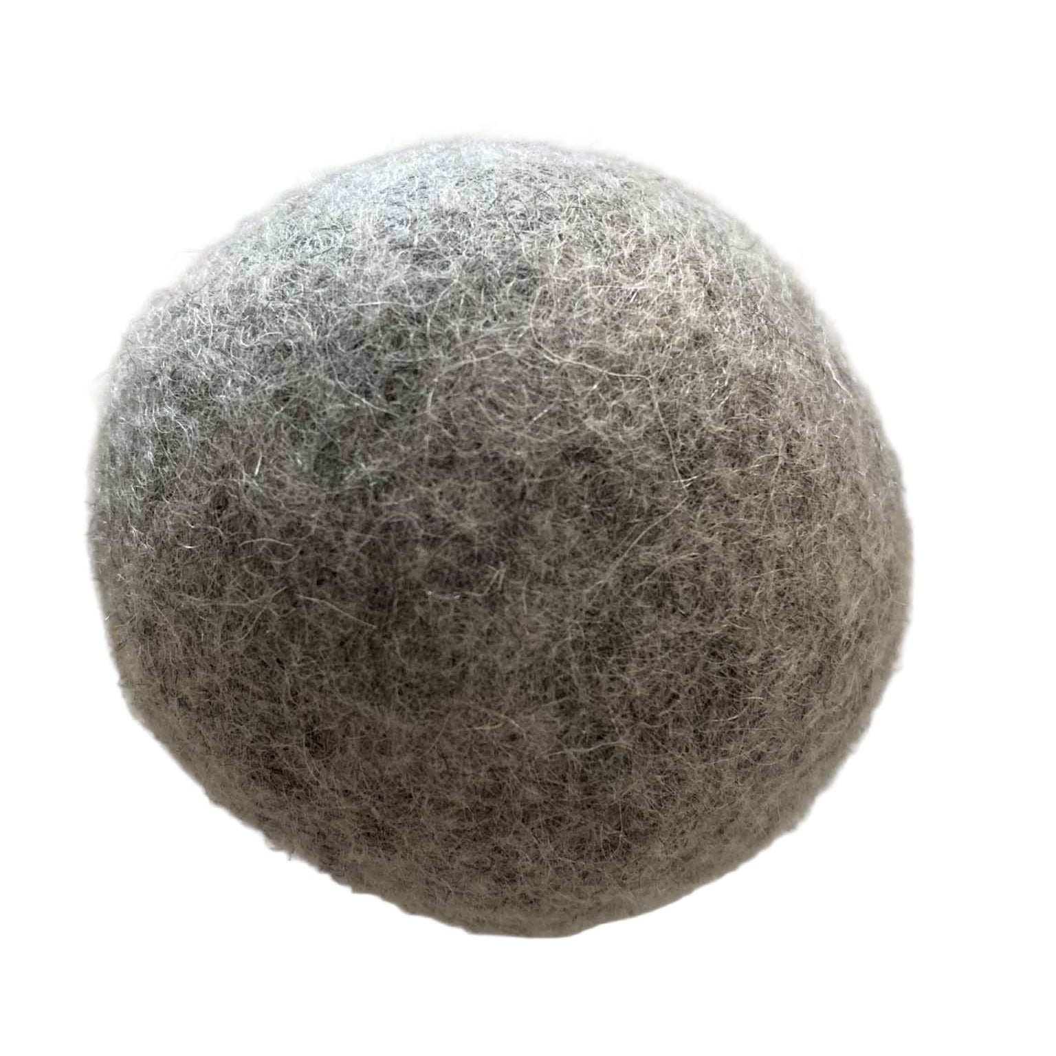 Close-up of Earthly Wool Dryer Balls showing textured surface and natural fibers in a close-up shot highlighting their