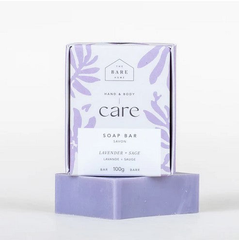 The Bare Home Lavender Sage hand and body soap bar in a rectangular white ceramic dish with textured surface