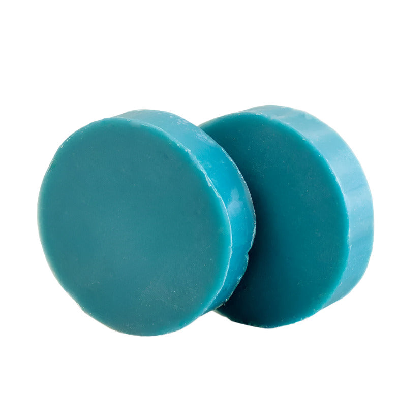 Leaf Shave natural soap bars in rectangular white packaging with black text and leaf logo, textured surface and green accents