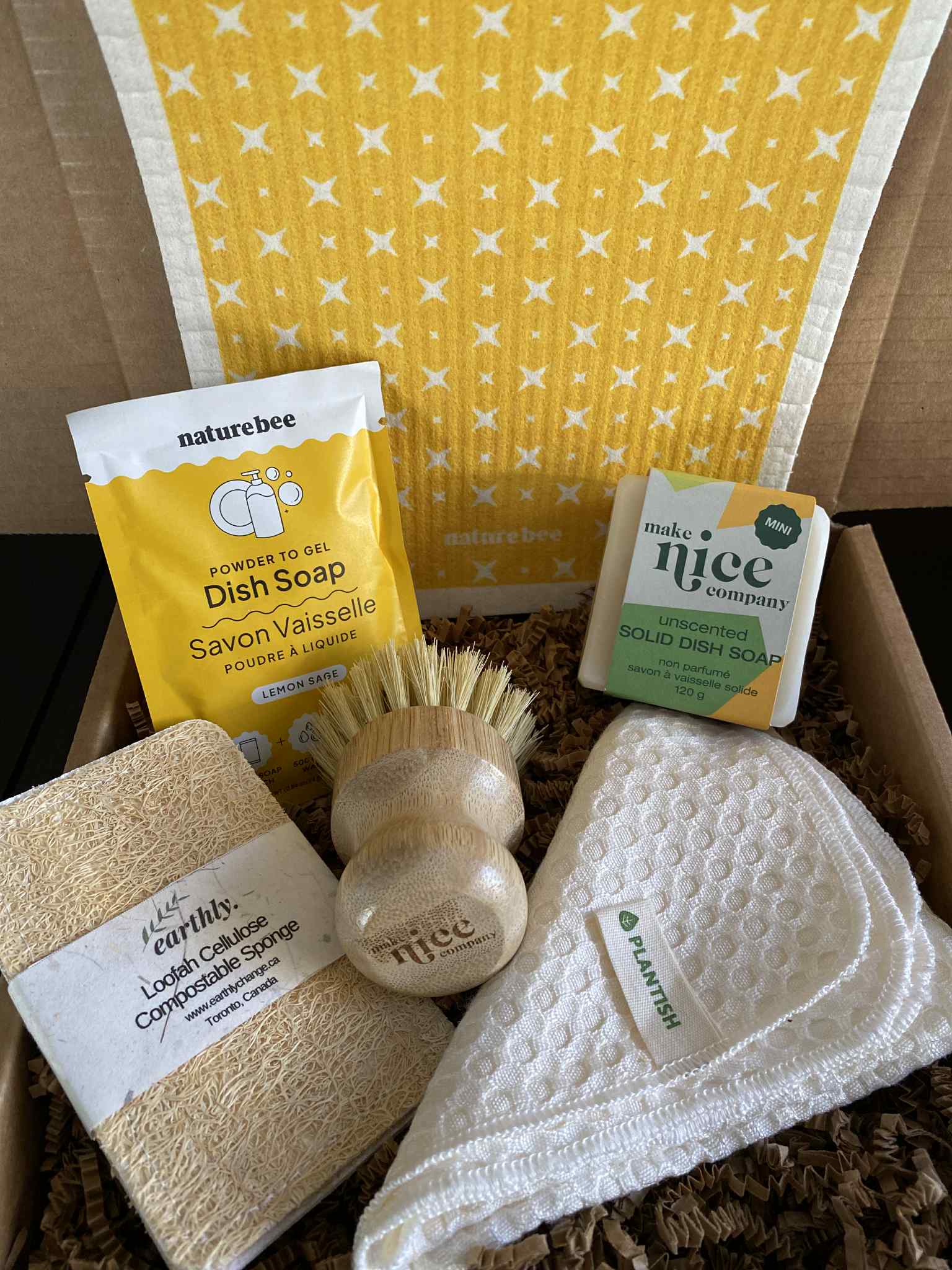 Canadian Brands Lemon Sage kitchen gift box with glass jar, wooden utensils, linen napkin, and reusable zero waste packaging