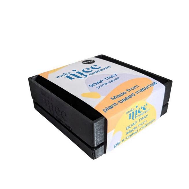 Close-up of the Make Nice Company soap dish tray’s textured silicone surface with drainage holes and beige color detail from