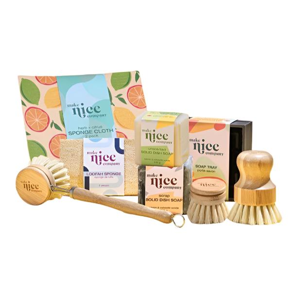 Make Nice Company Ultimate Essentials Set with clear dish soap bottle, biodegradable sponge, and bamboo scrub brush in zero