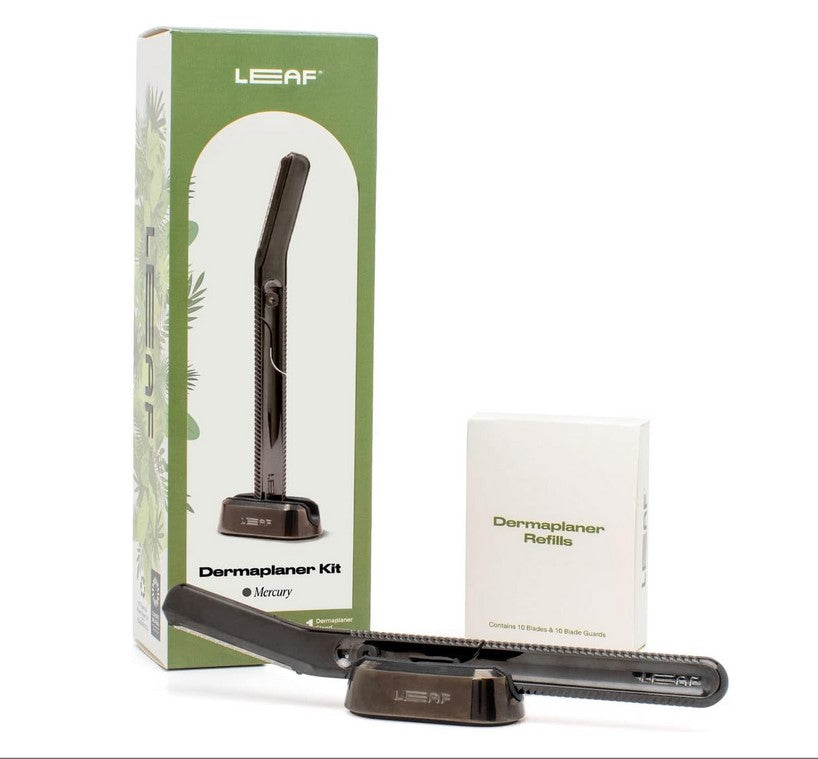 Leaf Mercury Dermaplaner Kit with stainless steel blade, white ergonomic handle, and protective cap for precise facial