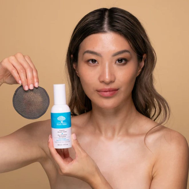 Close-up of the Micellar Cleansing Water bottle label showing ingredients like chamomile extract and soothing aloe, 200ml